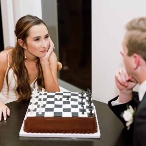 A friendly game of chess with the groom's cake | Petite Sweets by Laura | Photo by Bailee Starr Photography